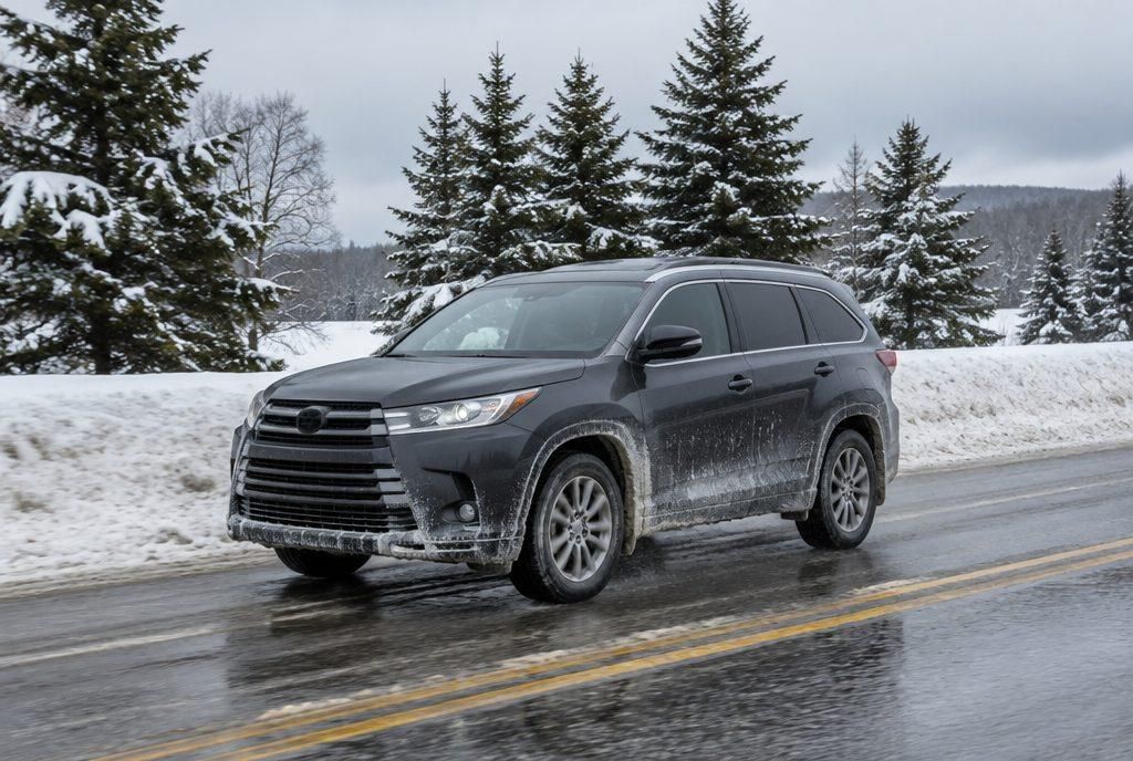 Example: an SUV on a salted Wisconsin road, its sides caked in salt and slush
